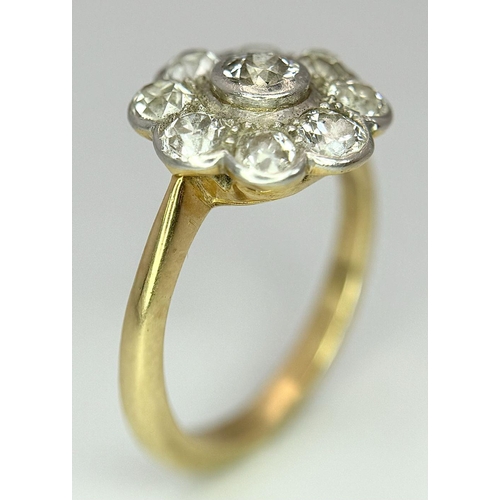 89 - An Antique 18K Yellow Gold (Tested) Diamond Ring in Floral Form. Nine round cut diamonds of 1.6ctw c... 