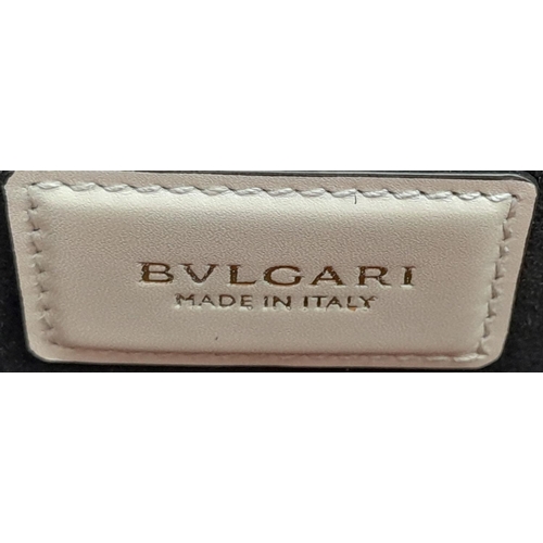 108 - A Bvlgari Burgundy Colour Block Serpenti Handbag. Leather exterior with gold-toned hardware, adjusta... 