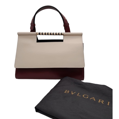 108 - A Bvlgari Burgundy Colour Block Serpenti Handbag. Leather exterior with gold-toned hardware, adjusta... 