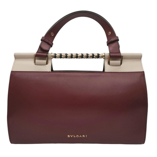 108 - A Bvlgari Burgundy Colour Block Serpenti Handbag. Leather exterior with gold-toned hardware, adjusta... 