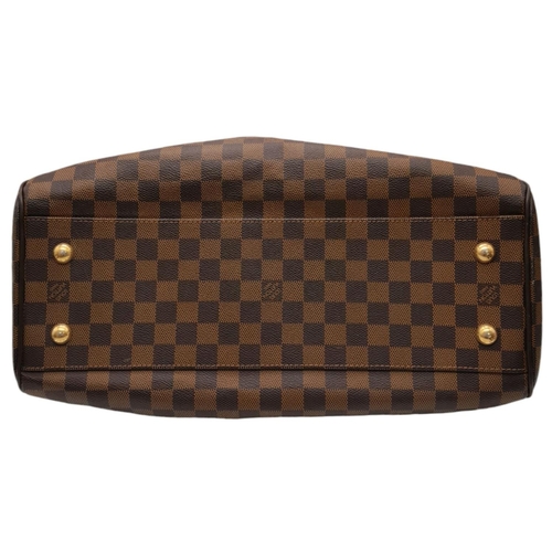 115 - A Louis Vuitton Damier Ebene Trevi Bag. Coated canvas exterior with leather trim, gold-toned hardwar... 