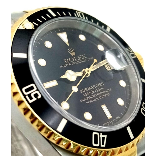 12 - A Rolex Submariner Gents Watch. Bi-Metal (18k gold and stainless steel) bracelet and case - 40mm. Mo... 