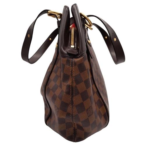 143 - A Louis Vuitton Damier Ebene Sistina Shoulder Bag. Coated canvas exterior with leather trim, gold-to... 