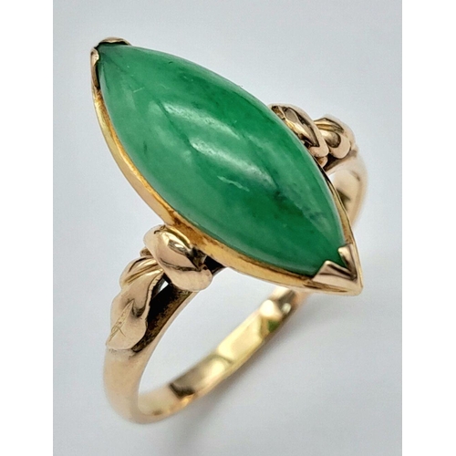 28 - Beautiful 14 CARAT GOLD RING set with Polished JADE BAGETTE to top in a stunning Gold Mount. 3 grams... 