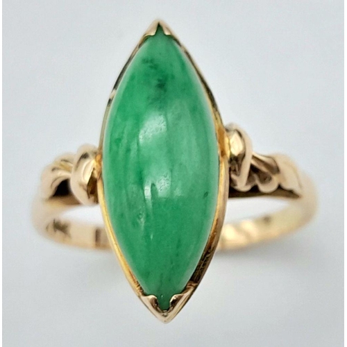 28 - Beautiful 14 CARAT GOLD RING set with Polished JADE BAGETTE to top in a stunning Gold Mount. 3 grams... 