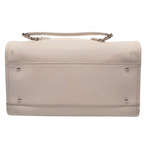 50 - A Chanel Deauville bag in off-white epi leather, cream suede interior with two zip pockets, silver t... 