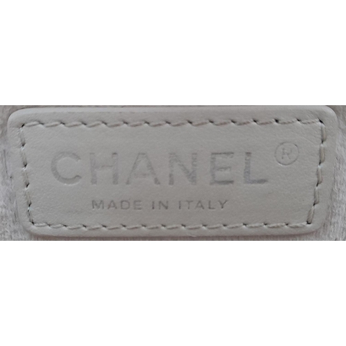 50 - A Chanel Deauville bag in off-white epi leather, cream suede interior with two zip pockets, silver t... 