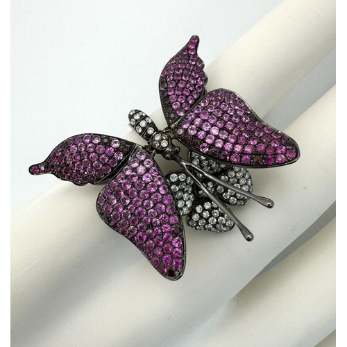 54 - An Enchanting 18K Gold, Diamond and Ruby Butterfly Dress Ring. A pave ruby large wingspan butterfly ... 