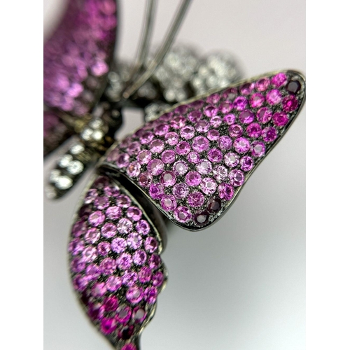 54 - An Enchanting 18K Gold, Diamond and Ruby Butterfly Dress Ring. A pave ruby large wingspan butterfly ... 