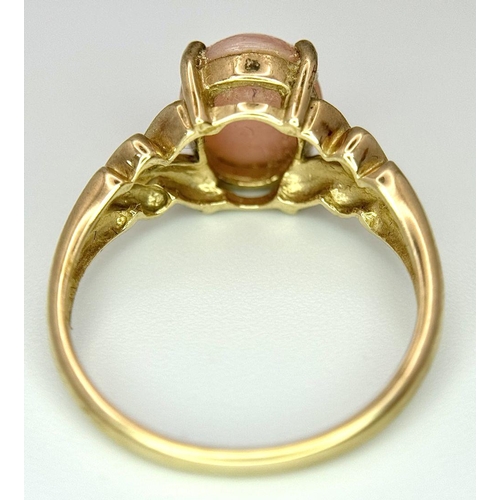 7 - Beautiful PINK OPAL CABOCHON Set into a fully hallmarked 9 carat GOLD RING. 2.8 grams. Size N.