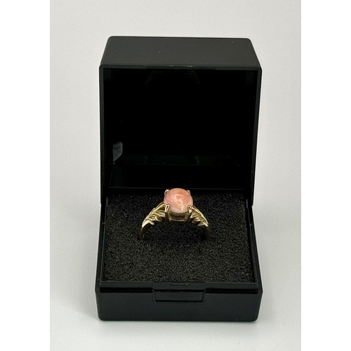 7 - Beautiful PINK OPAL CABOCHON Set into a fully hallmarked 9 carat GOLD RING. 2.8 grams. Size N.