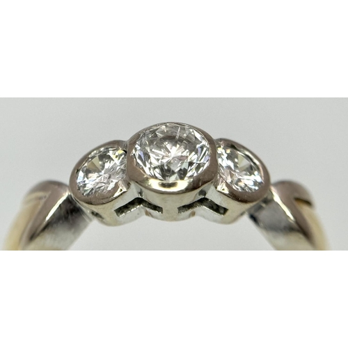 11 - AN 18K YELLOW GOLD OLD CUT DIAMOND 3 STONE RING - 0.75CT. 5.2G. SIZE M. A/S 1148