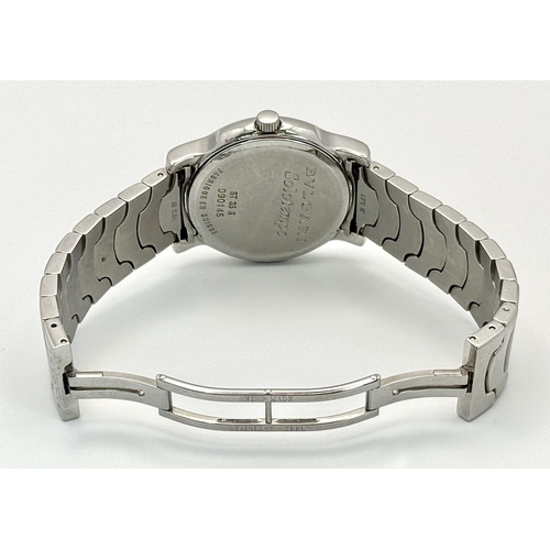 137 - A BVLGARI SOLOTEMPO STEEL BRACLET WATCH WITH BLUE DIAL AND DATE FUNCTION. CASE -  ST35 S WITH BOX AN... 
