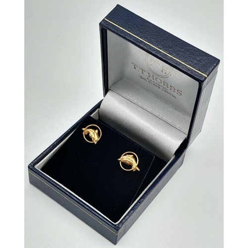14 - Classic pair of 9 CARAT GOLD DOLPHIN STUD EARRINGS.Consisting Dolphins swimming through hoops. Compl... 
