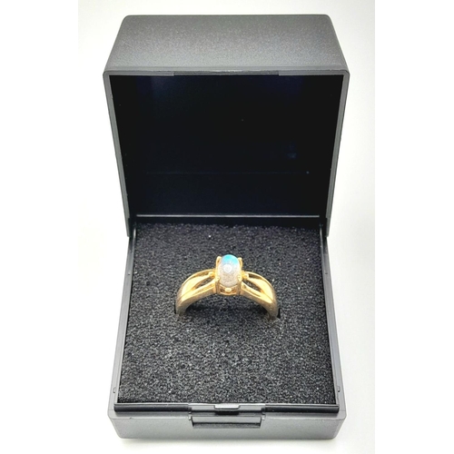 168 - Pretty and Pleasing 9 carat GOLD RING with Colour Catching RAINBOW MOONSTONE mounted  to top. The ri... 