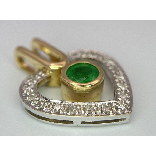 271 - A 14K YELLOW GOLD, DIAMOND & EMERALD HEART SHAPED PENDANT. 3.2G. SC 2032.