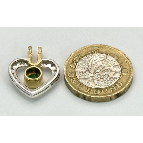 271 - A 14K YELLOW GOLD, DIAMOND & EMERALD HEART SHAPED PENDANT. 3.2G. SC 2032.