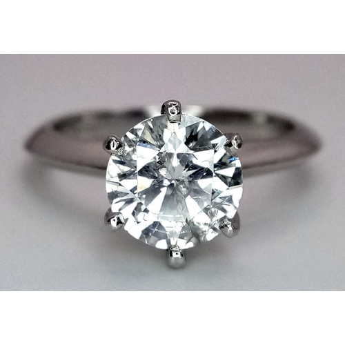 30 - A PLATINUM DIAMOND SOLITAIRE RING - 2CT ROUND BRILLIANT CUT. 6.4G WEIGHT. SIZE N. STONE HAS BEEN LAS... 