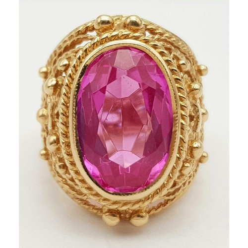 44 - A 14K ROSE GOLD PINK STONE COCKTAIL STYLE RING. 11.3G. SIZE I/J.