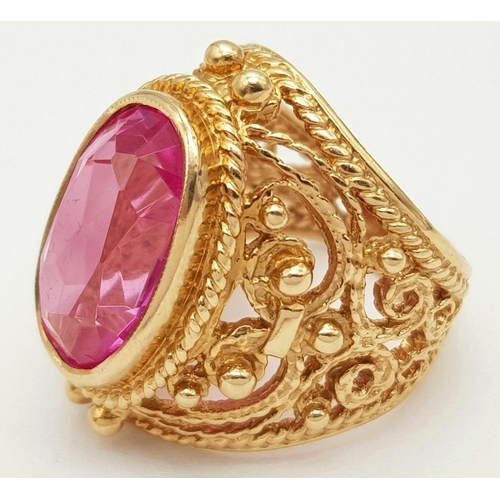 44 - A 14K ROSE GOLD PINK STONE COCKTAIL STYLE RING. 11.3G. SIZE I/J.