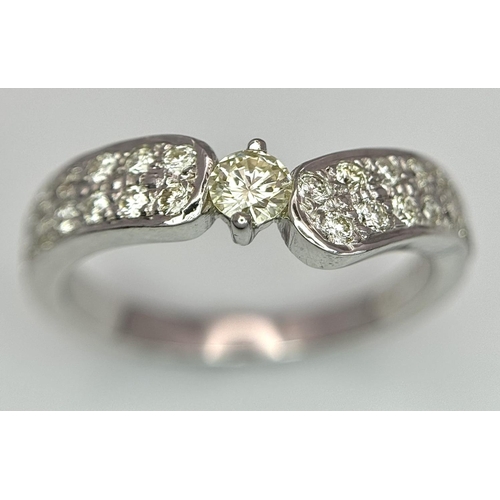46 - A 18K WHITE GOLD DIAMOND SET RING 0.60CT 3.8G SIZE M 1/2. Ref: SC 2082