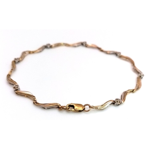 84 - An exquisite WHITE and YELLOW GOLD TENNIS BRACELET set with DIAMONDS and SERPENTINE GOLD LINKS. 2.8 ... 