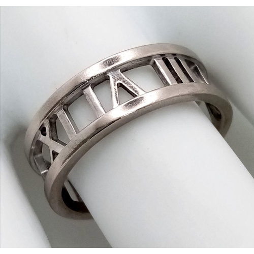 25 - A TIFFANY & CO 18K WHITE GOLD ATLAS BAND RING. 6.1G. SIZE R. SC 2038.