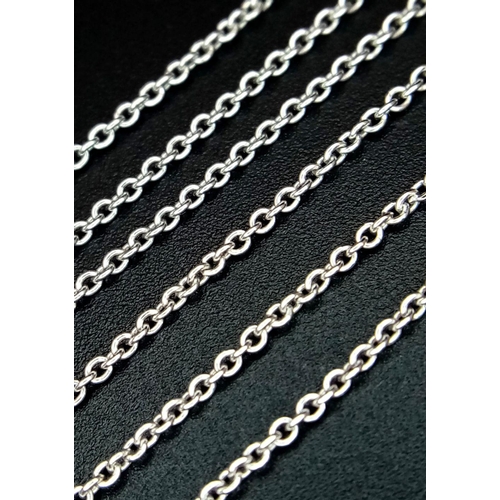 40 - A 14K White Gold and Diamond Galaxy-Esque Pendant and three strand necklace. A hanging pendant with ... 