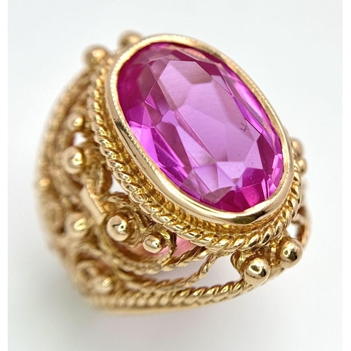 44 - A 14K ROSE GOLD PINK STONE COCKTAIL STYLE RING. 11.3G. SIZE I/J.