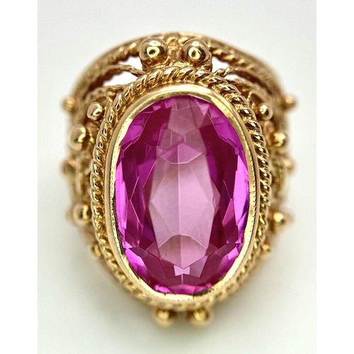44 - A 14K ROSE GOLD PINK STONE COCKTAIL STYLE RING. 11.3G. SIZE I/J.
