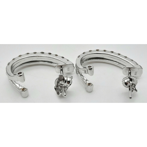 67 - A PAIR OF 18K WHITE GOLD DIAMOND SET EARRINGS. 5.2G.