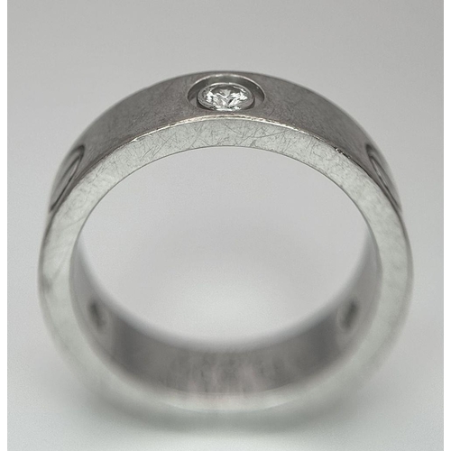 10 - A Classic Cartier 18K White Gold 'Love' Diamond Band Ring. Size M. 9g. Comes with a Cartier case. Re... 