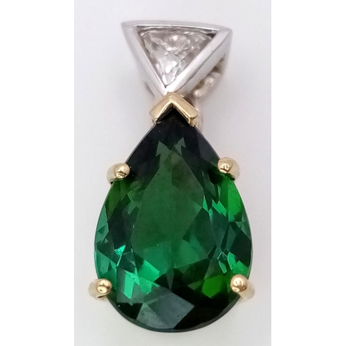 102 - A 18K two gold-tone pear shaped tourmaline pendant set with trillion cut diamond, 0.15ct diamond wei... 