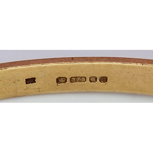 116 - A 9K yellow gold engraved bangle, 9.5g total weight, 6.5cm diameter. Ref: SH1678I