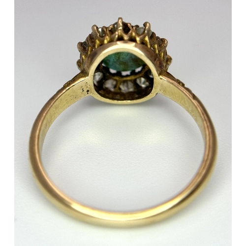 256 - A 18K yellow gold turquoise and diamond halo ring, 0.36ct diamond weight, 3.1g total weight, size M ... 