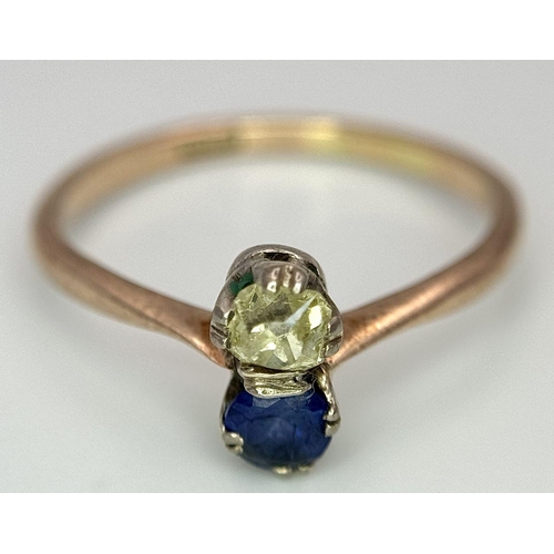 263 - A 18K yellow gold 2 stone old cut diamond and sapphire ring, 4x4mm diamond, 0.34ct sapphire weight, ... 
