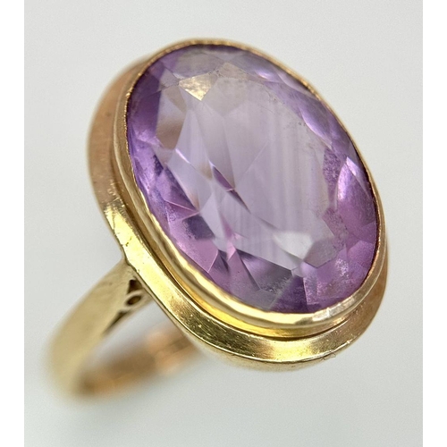 284 - A 9K yellow gold amethyst ring, 10x15mm amethyst, 4.5g total weight, size N. Ref: SH1684I