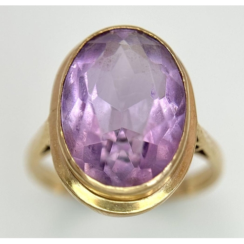 284 - A 9K yellow gold amethyst ring, 10x15mm amethyst, 4.5g total weight, size N. Ref: SH1684I