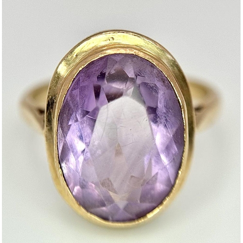 284 - A 9K yellow gold amethyst ring, 10x15mm amethyst, 4.5g total weight, size N. Ref: SH1684I