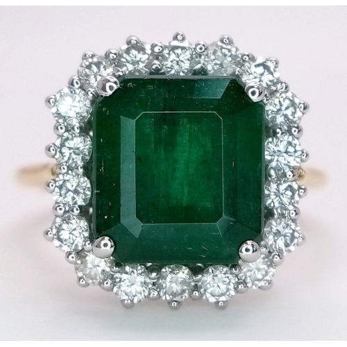 296 - A Head Turning 950 Platinum and 18K Yellow Gold (tested) Emerald with Diamond Surround Dress Ring. 4... 