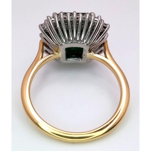 296 - A Head Turning 950 Platinum and 18K Yellow Gold (tested) Emerald with Diamond Surround Dress Ring. 4... 