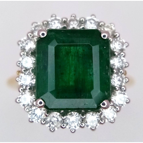 296 - A Head Turning 950 Platinum and 18K Yellow Gold (tested) Emerald with Diamond Surround Dress Ring. 4... 