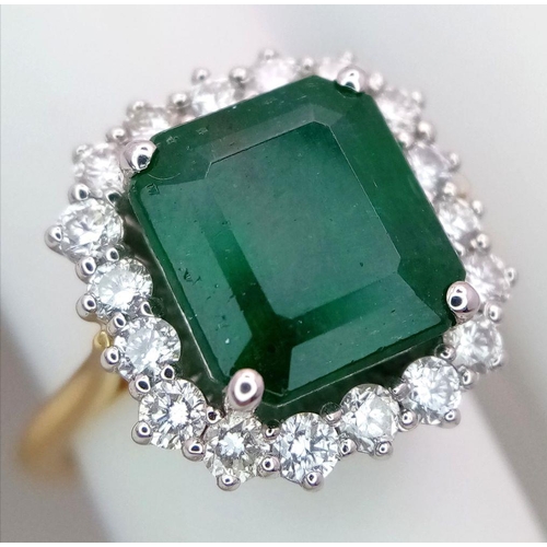 296 - A Head Turning 950 Platinum and 18K Yellow Gold (tested) Emerald with Diamond Surround Dress Ring. 4... 