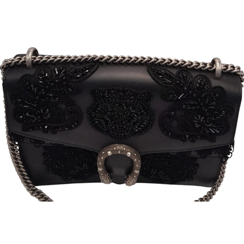 162 - A Gucci Dionysus Embroidered Shoulder Bag. Black leather exterior with silver-toned tiger head spur ... 