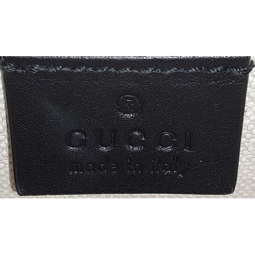 162 - A Gucci Dionysus Embroidered Shoulder Bag. Black leather exterior with silver-toned tiger head spur ... 