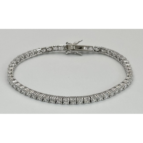 479 - A 925 Silver White Zircon Tennis Bracelet. 17cm. 10.66g.