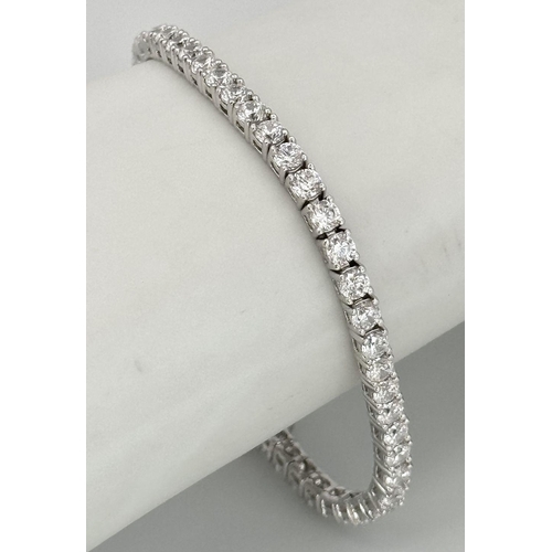 479 - A 925 Silver White Zircon Tennis Bracelet. 17cm. 10.66g.