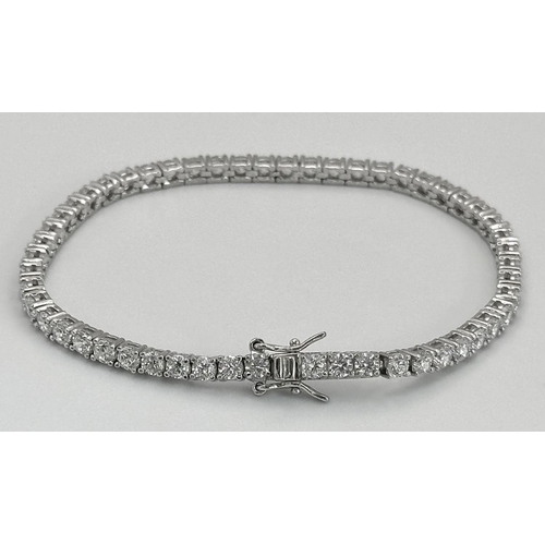 479 - A 925 Silver White Zircon Tennis Bracelet. 17cm. 10.66g.