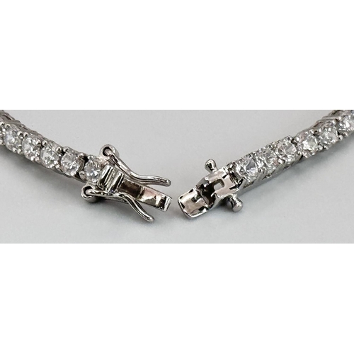 479 - A 925 Silver White Zircon Tennis Bracelet. 17cm. 10.66g.