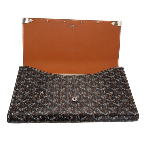 87 - A Goyard Honore Clutch. Coated canvas and leather exterior with silver-toned hardware and a button s... 